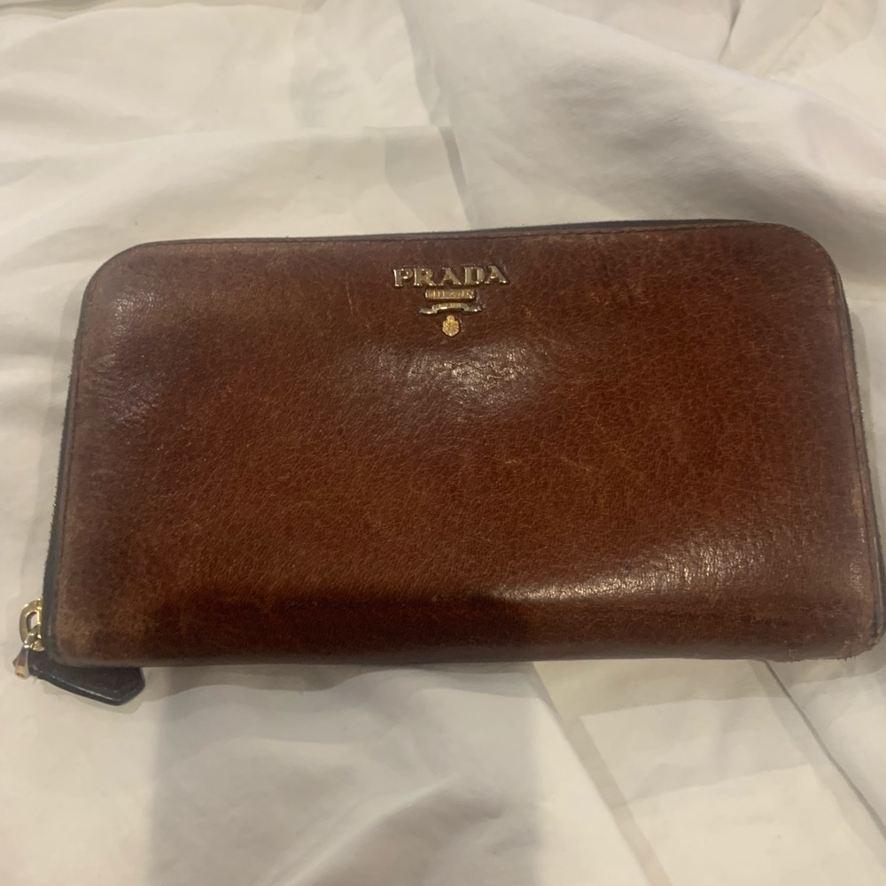 Prada. Ladies zip around wallet.